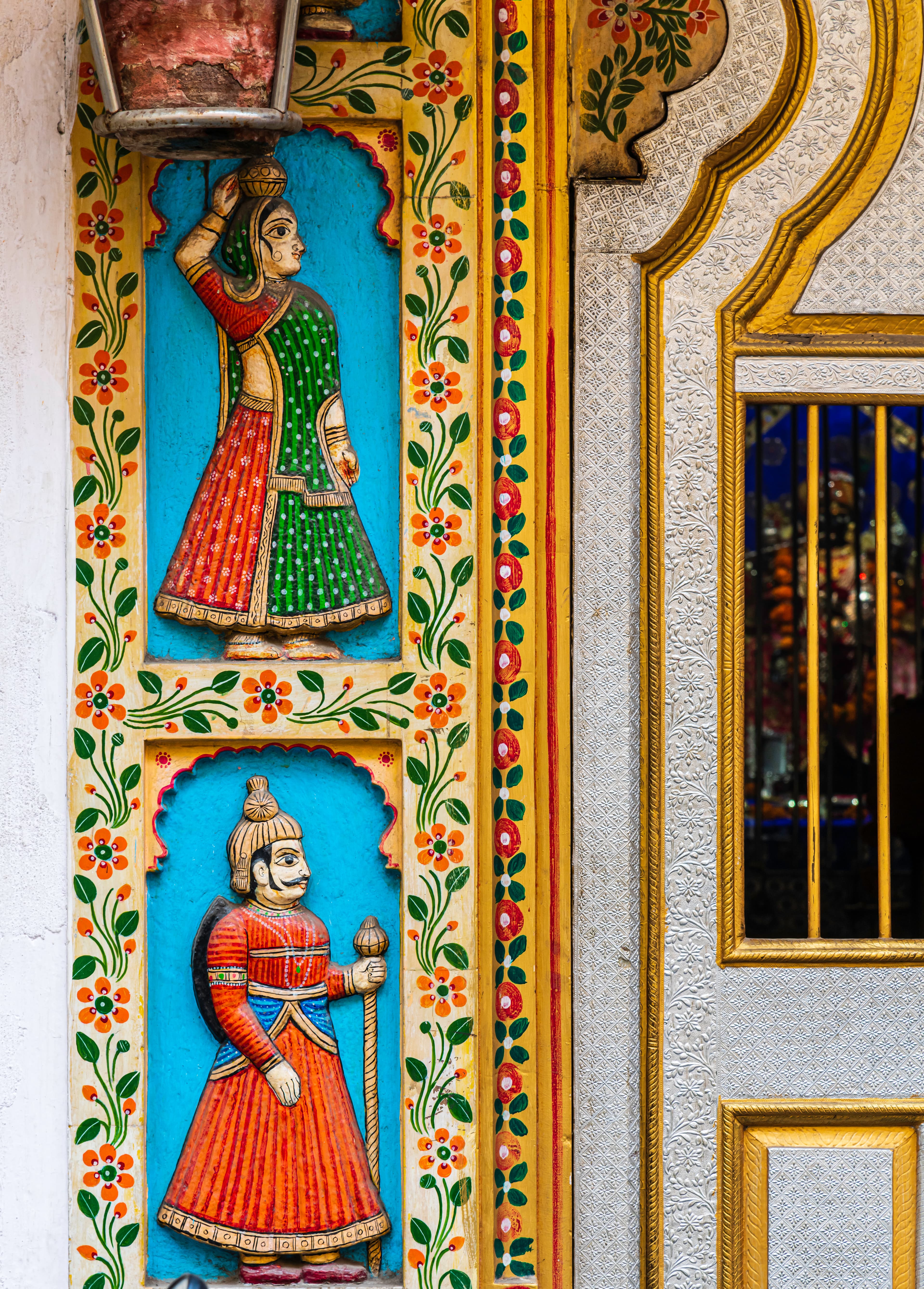 Guardians of Tradition – Vibrant Rajasthani Wall Art at Storefront