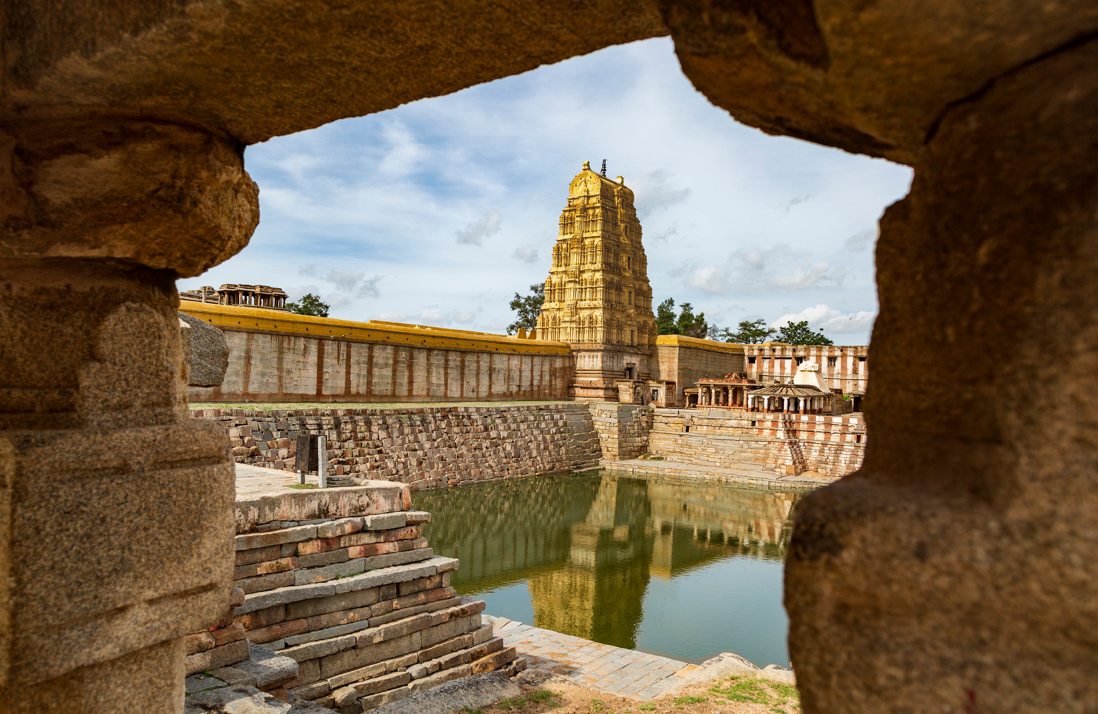 Reflections of Divinity Virupaksha Temple through the Stone Arch