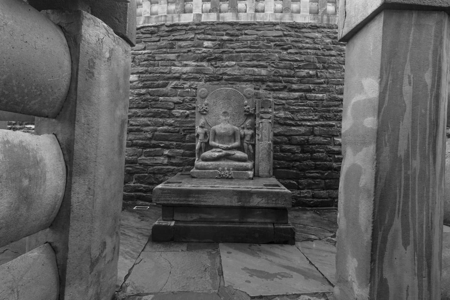 Ancient Buddha Sculpture at Sanchi Stupa – Serenity in Stone
