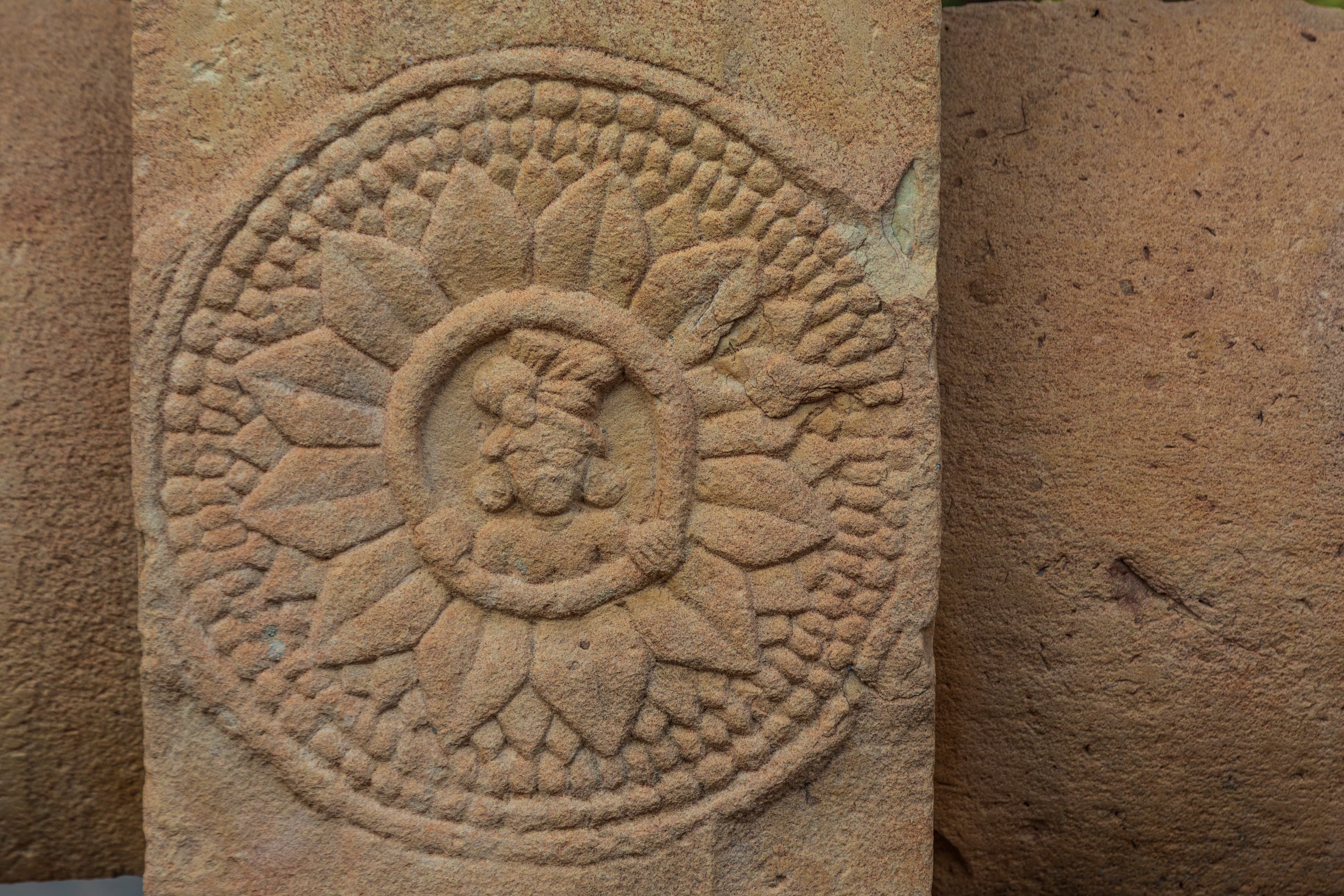 Floral Medallion with Human Motif – Sanchi Stupa Detail