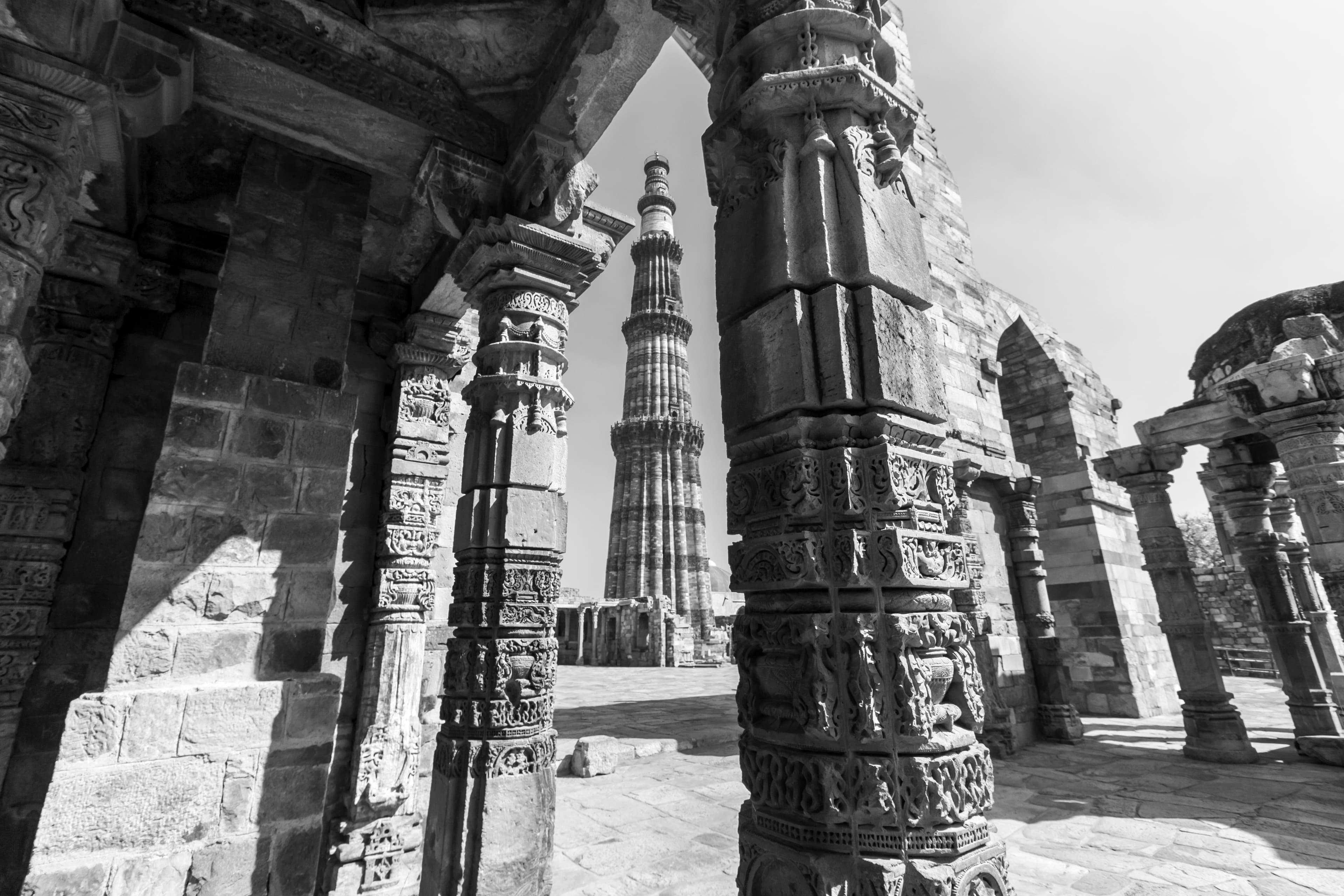 Qutub Minar Framed by Heritage Arches – Timeless Delhi