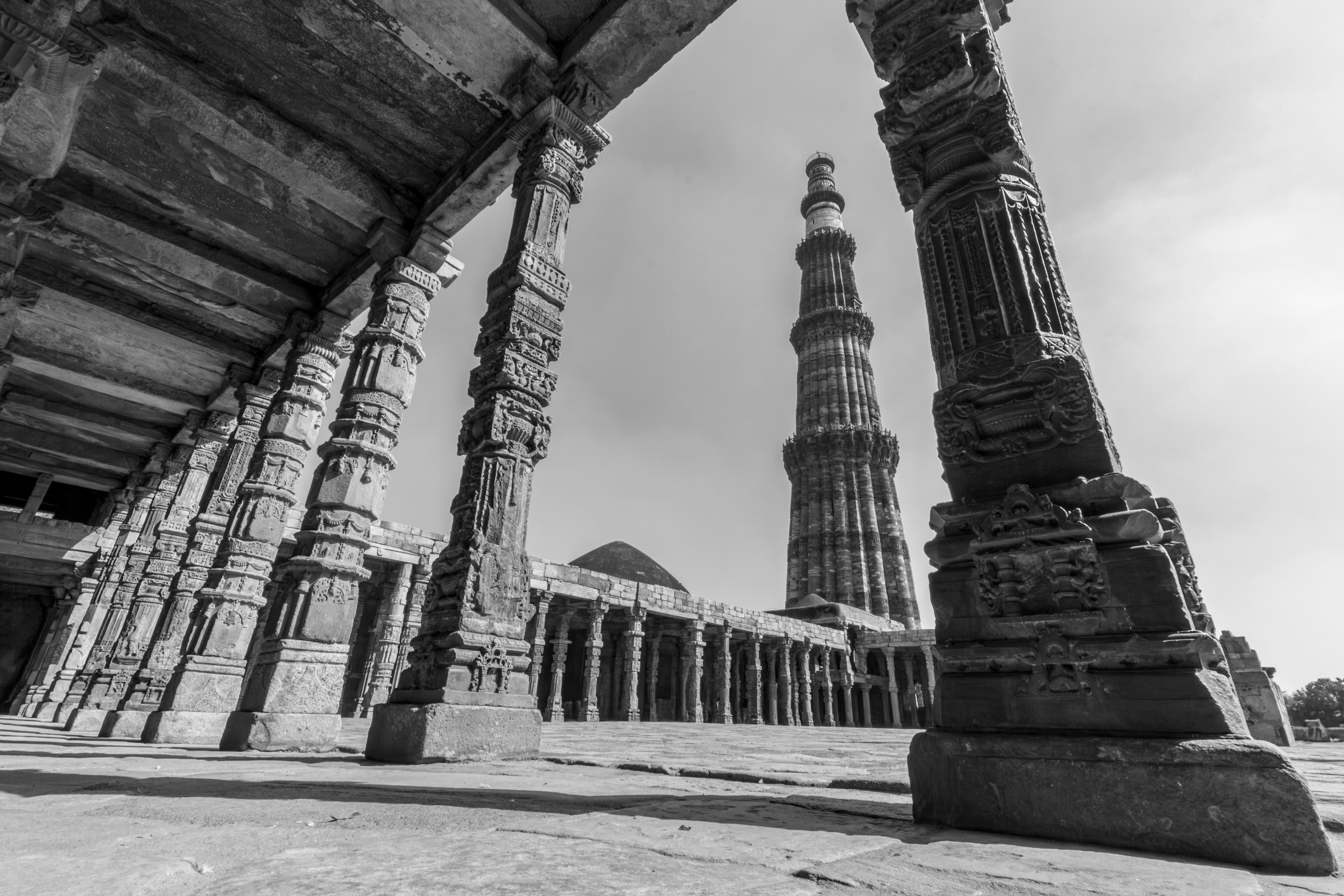 Framed Legacy Qutub Minar from Stone Arches