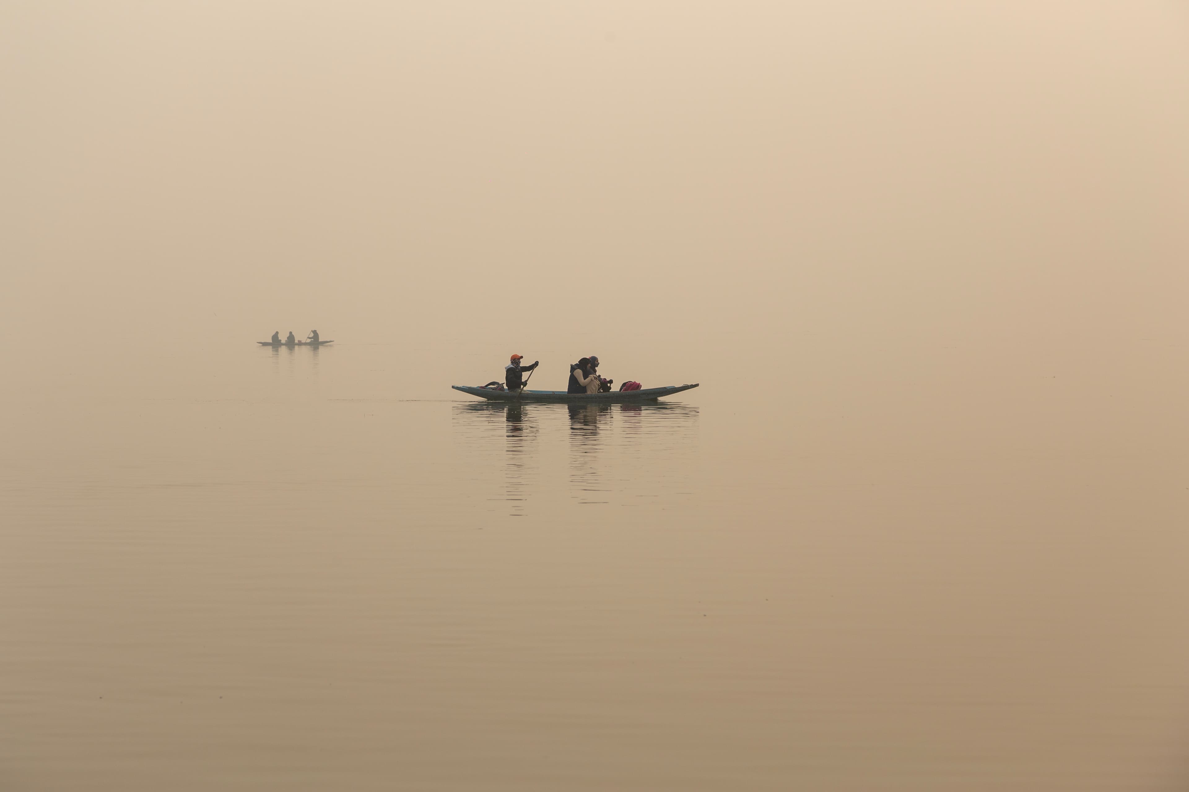 Shikara Silhouettes in the Morning Haze