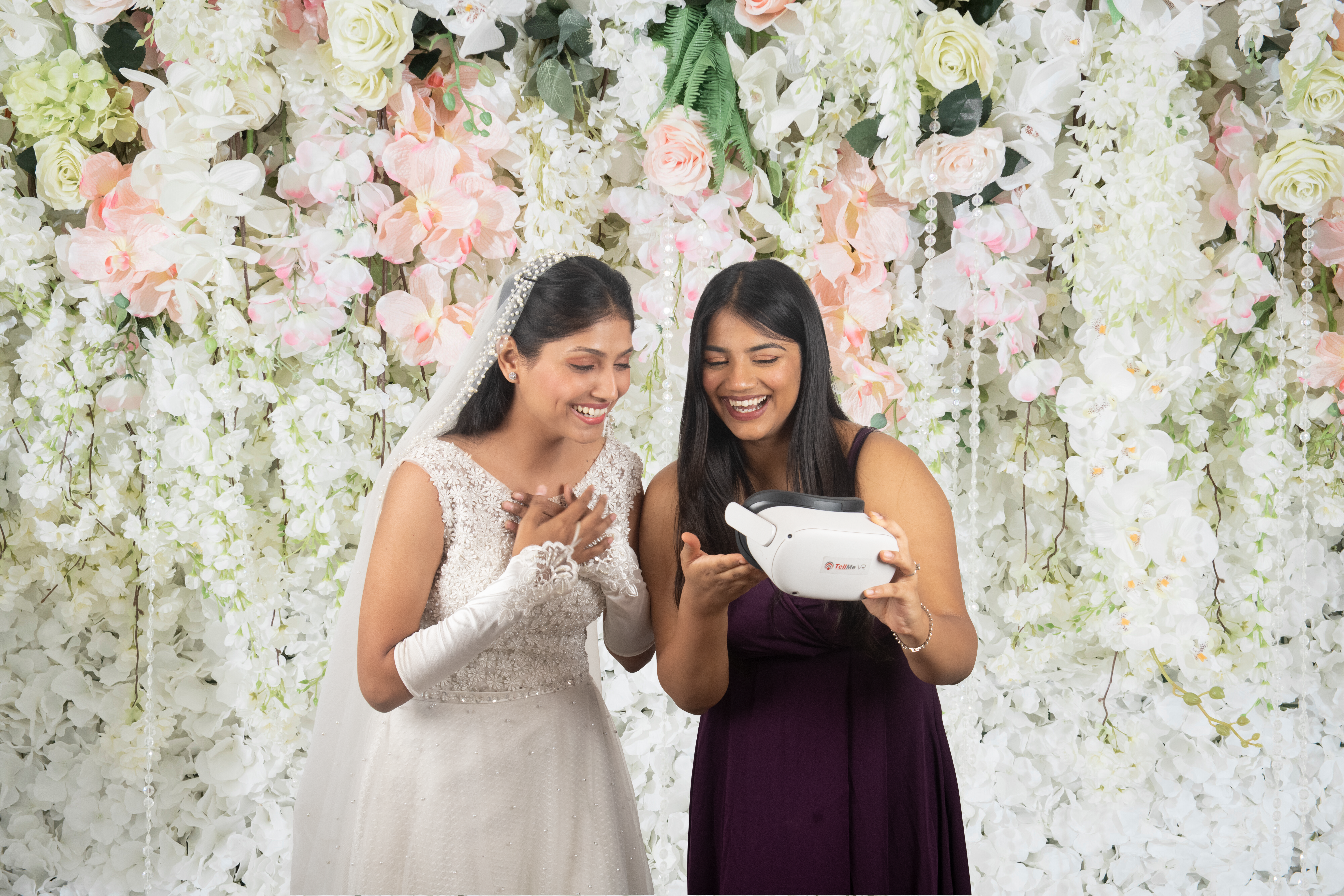 Bride and friend with VR headset